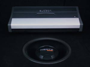 Audison amplifier and Hertz subwoofer in a custom boot fabrication